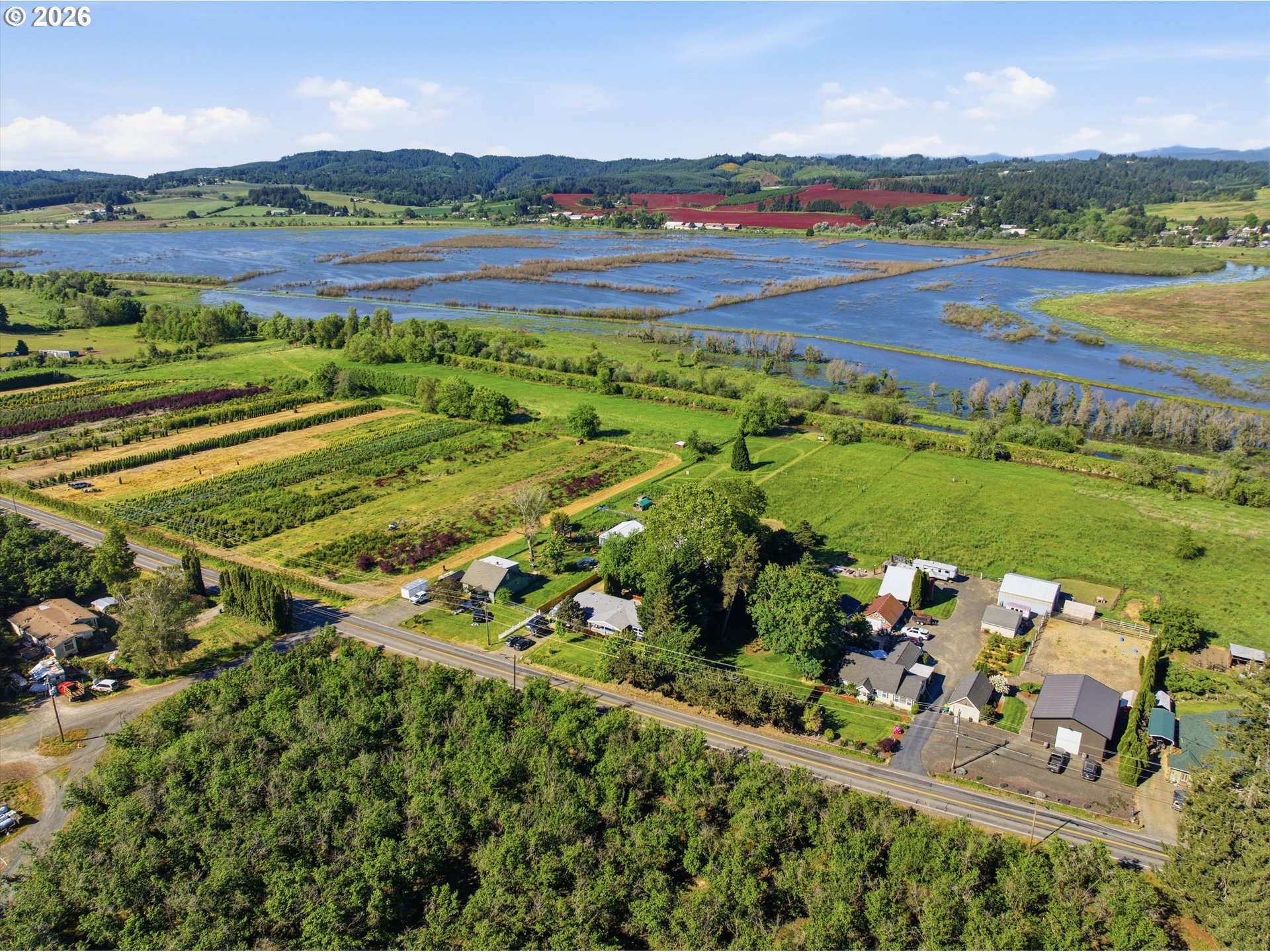 11661 Southwest Spring Hill Road Gaston, OR 97119 - Photo 45 of 45 an aerial view of a golf course with a yard