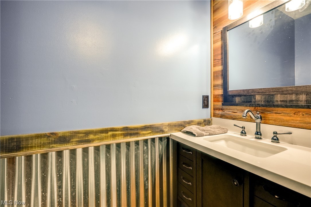 13920 Kneisel Road Vermilion, OH 44089 - Photo 25 of 35 1/2 bath in laundry room