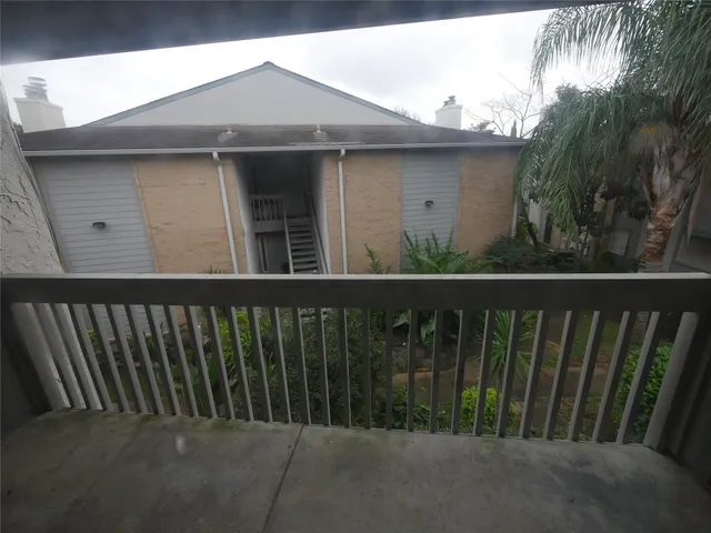 a view of a wooden fence