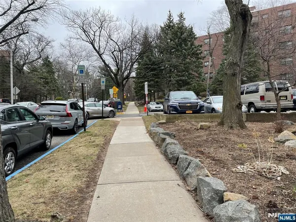 a cars parked on the side of a street