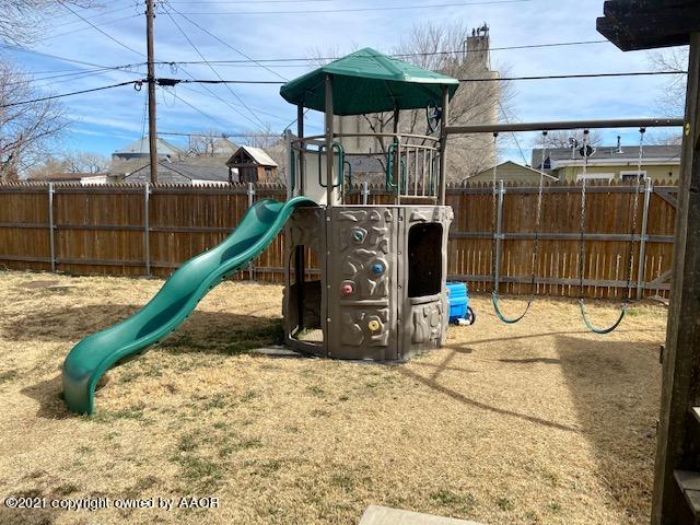 4339 South Tyler Street Amarillo, TX 79110 - Photo 9 of 11 a view of a park with a slide