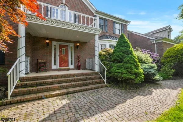 a view of a building with stairs and plants