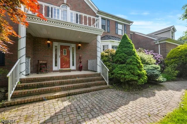 a view of a building with stairs and plants