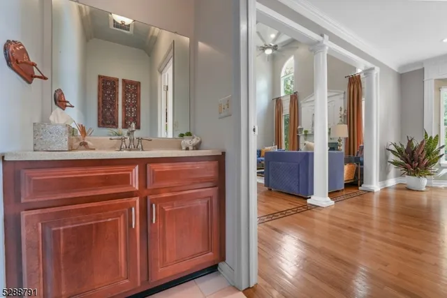 a bathroom with a sink and a mirror