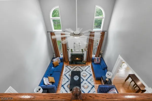 a bathroom with a sink double vanity granite and a window