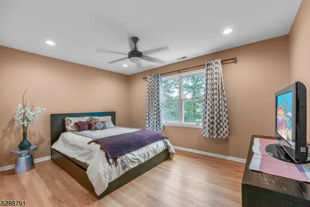 a view of a porch with furniture window and wooden floor