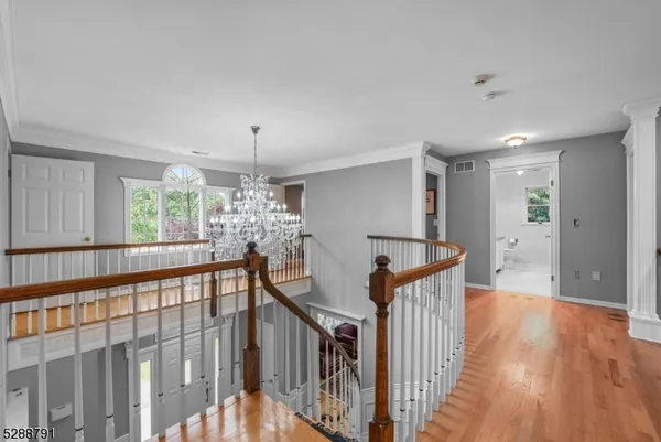 a view of a patio with couches table and chairs and potted plants