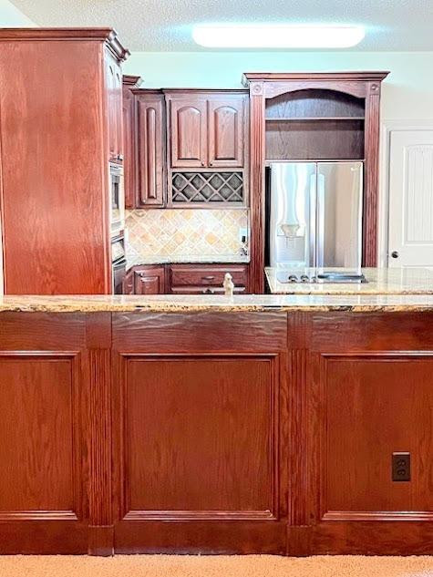 3913 100th Street Lubbock, TX 79423 - Photo 6 of 35 a bathroom with a sink a mirror and a window