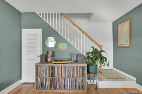 a view of entryway with wooden floor