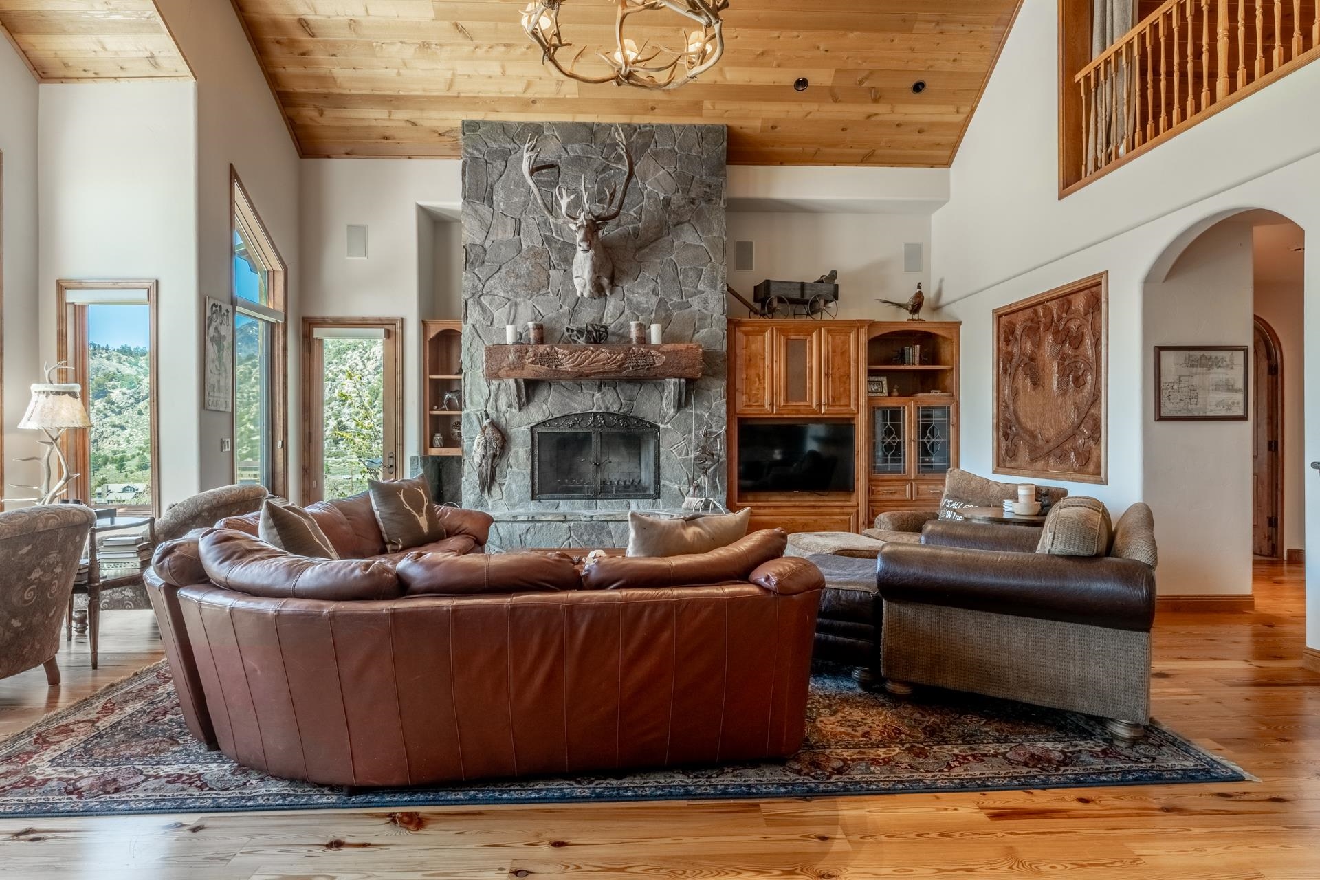 45 Skyline Road June Lake, CA 93529 - Photo 6 of 58 a living room with furniture and a fireplace