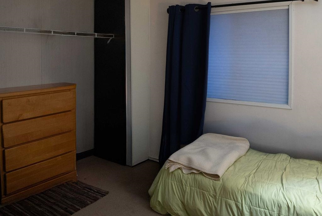 100 Ski Trails Road, Unit 40 Mammoth Lakes, CA 93546 - Photo 14 of 15 a bedroom with a bed and a closet