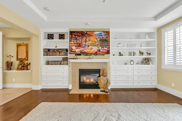 a kitchen with stainless steel appliances kitchen island granite countertop a table and chairs