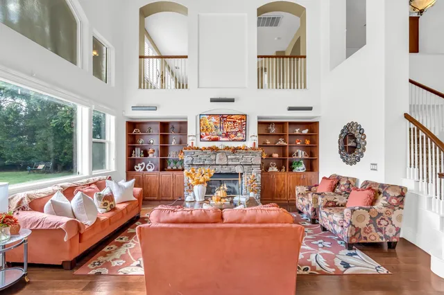 a bedroom with a bed and a television