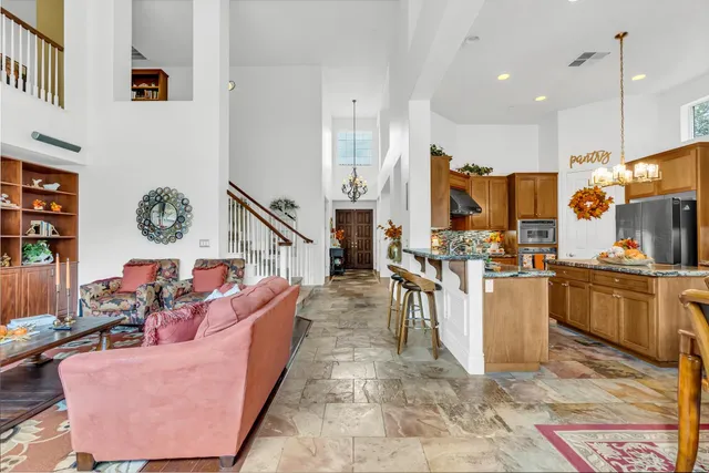 a bedroom with two beds and a flat screen tv