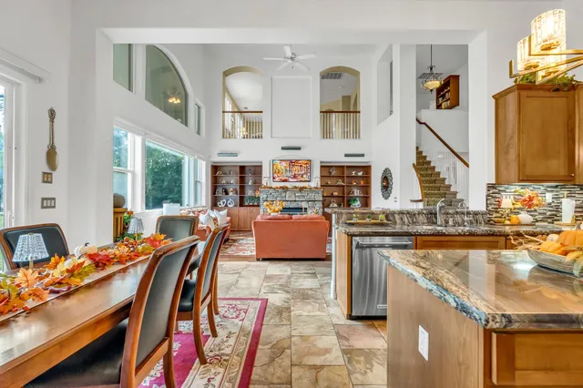 a bed room with a bed and a chandelier