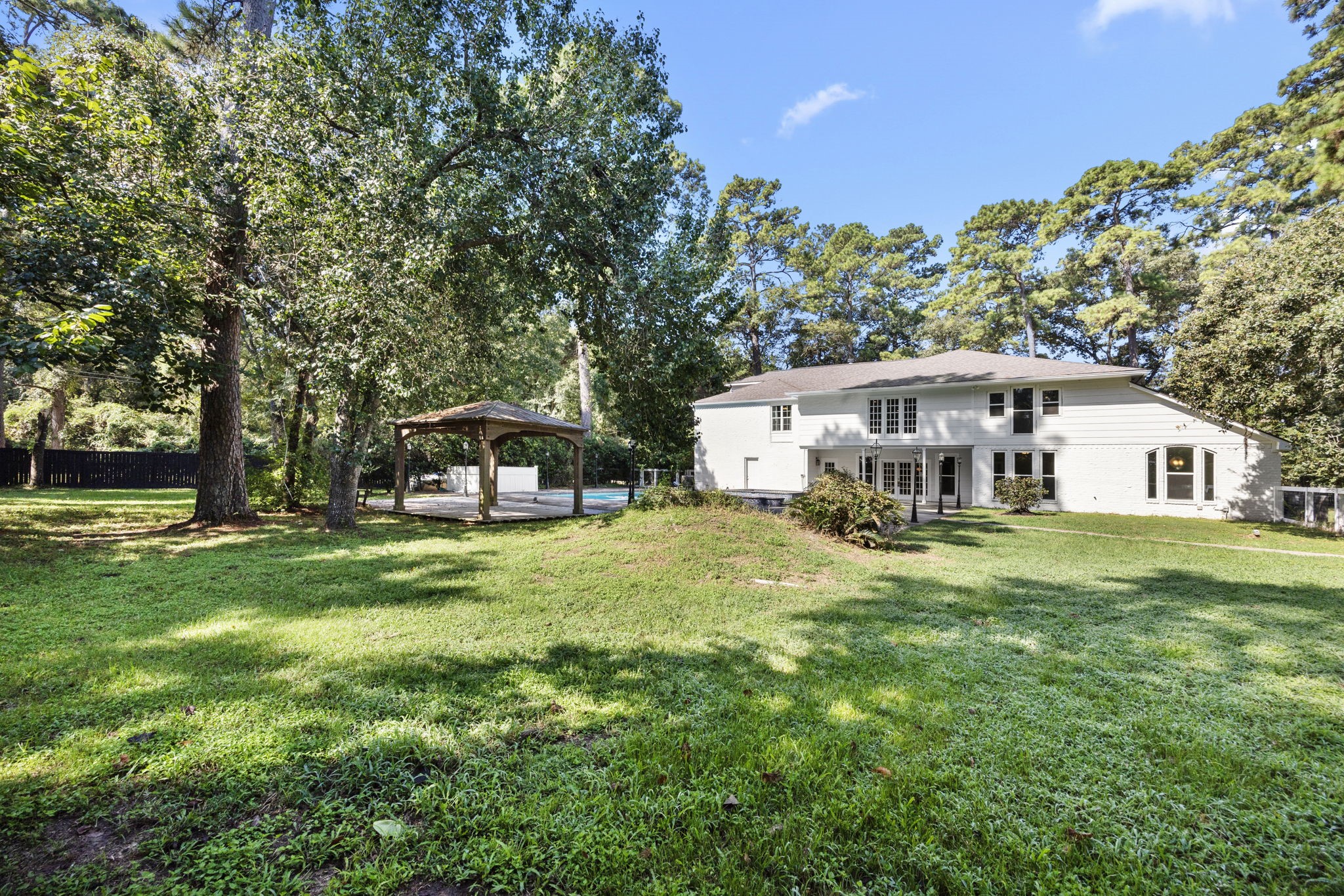 21802 Lindheimer Road Hockley, TX 77447 - Photo 11 of 50 a front view of a house with a garden