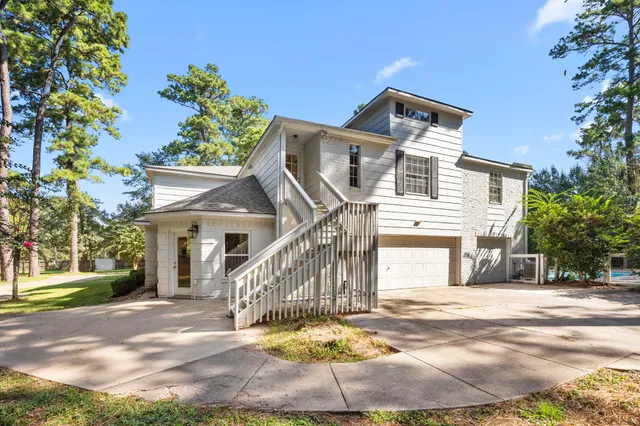 a view of livingroom with furniture and staircase