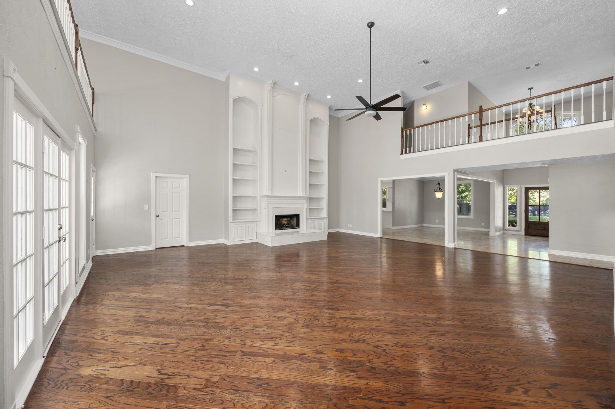 21802 Lindheimer Road Hockley, TX 77447 - Photo 28 of 50 a view of an empty room with window and wooden floor