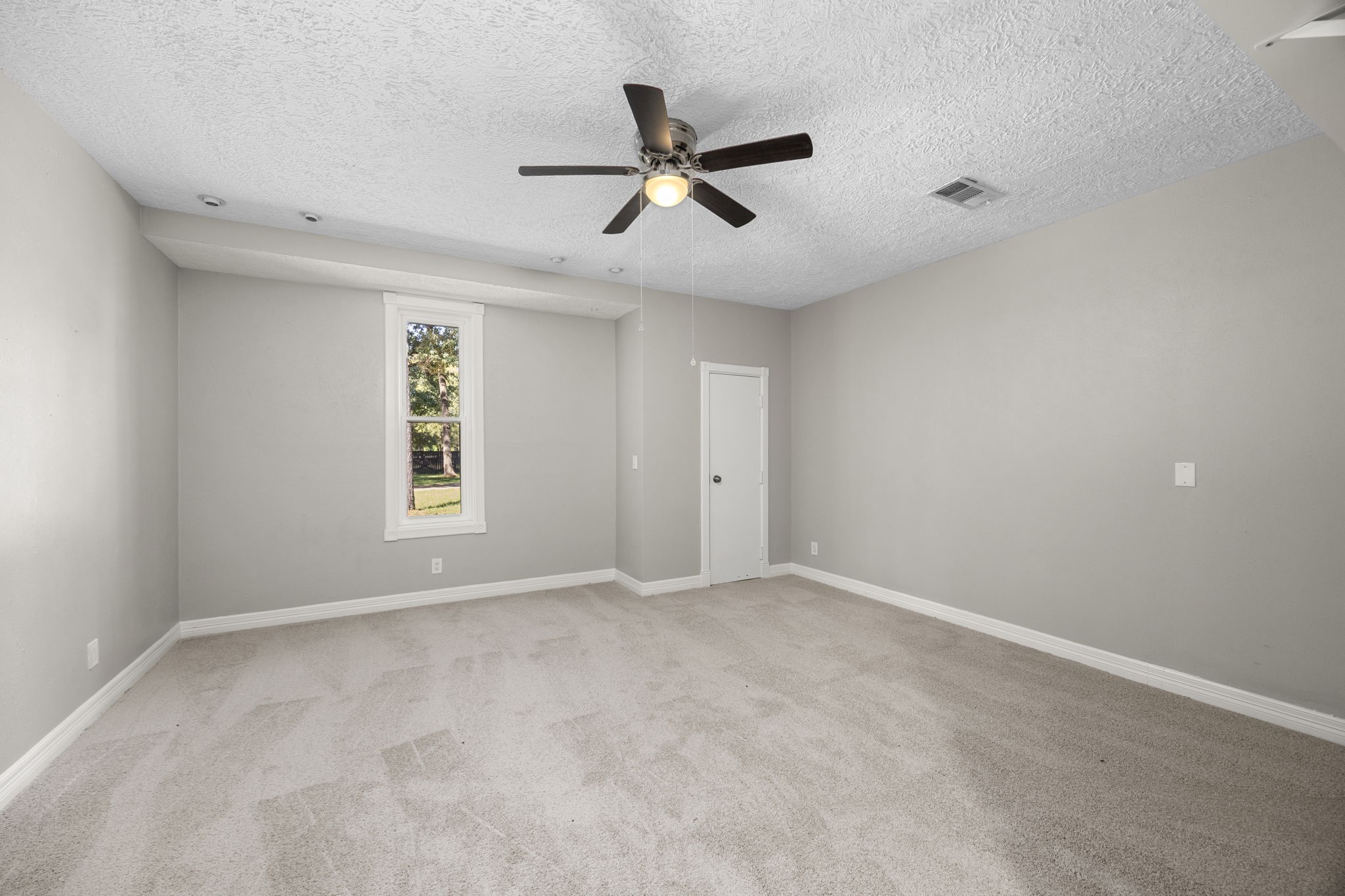 21802 Lindheimer Road Hockley, TX 77447 - Photo 33 of 50 a view of an empty room with a window