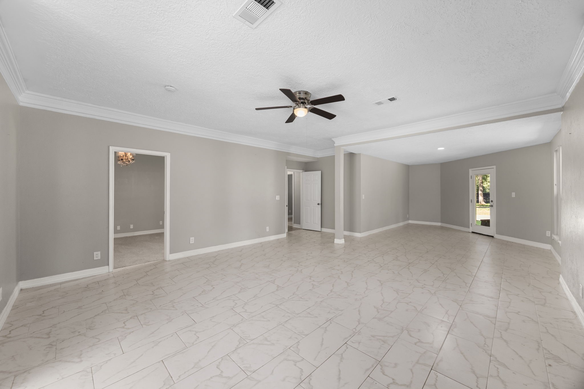 21802 Lindheimer Road Hockley, TX 77447 - Photo 35 of 50 a view of a livingroom with a ceiling fan and window