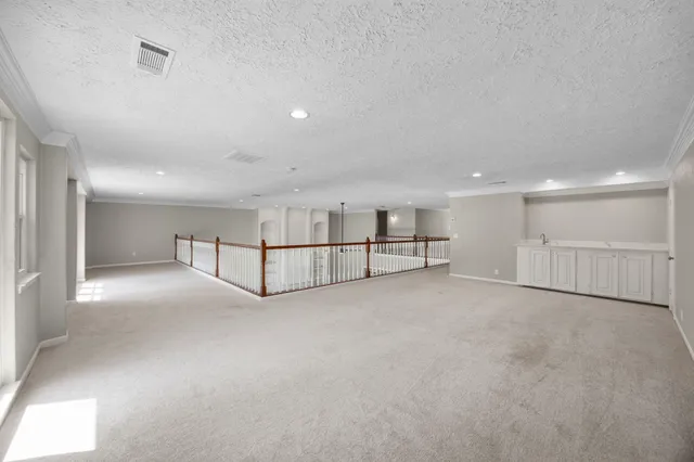 a view of hallway with stairs
