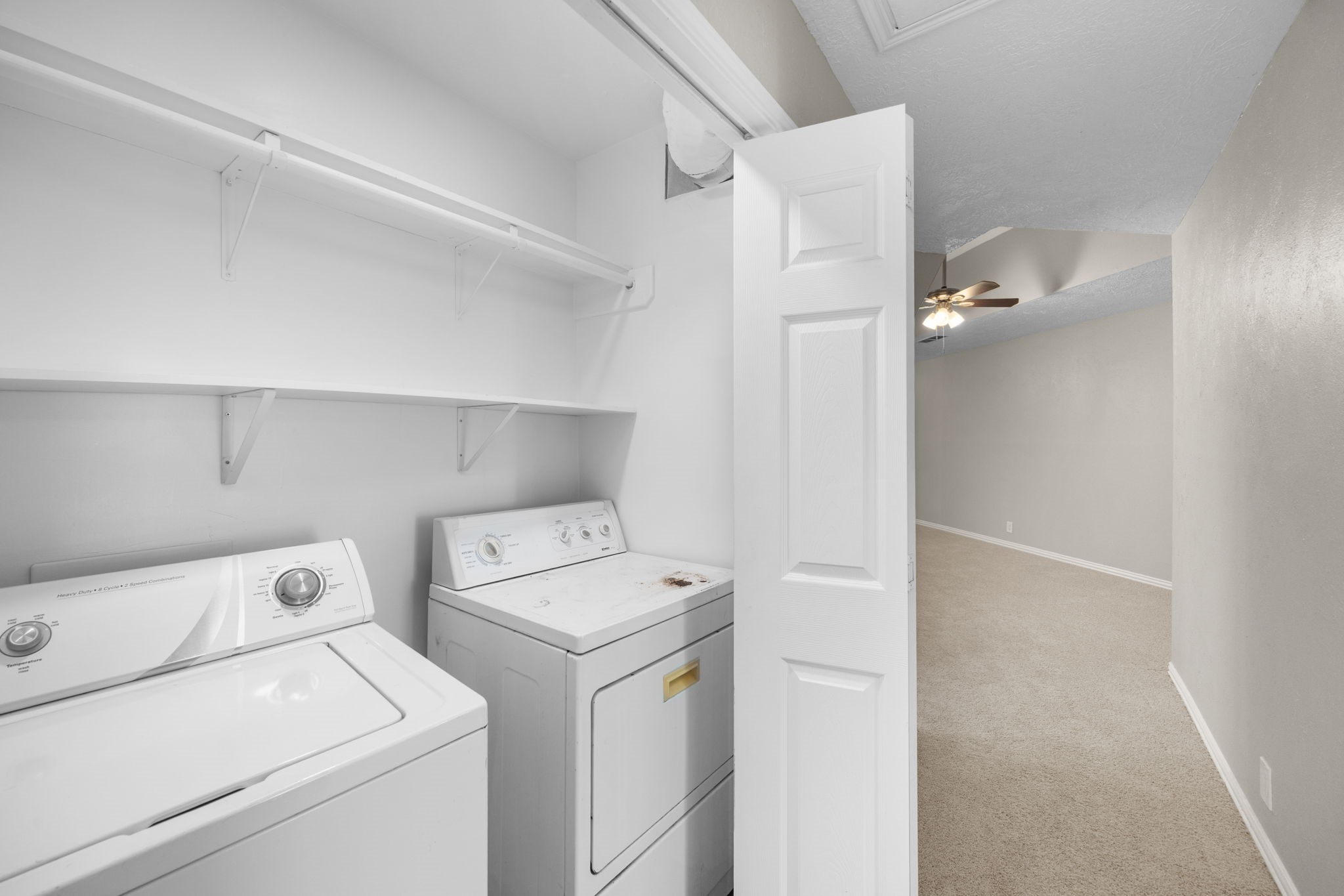 21802 Lindheimer Road Hockley, TX 77447 - Photo 50 of 50 a utility room with dryer and washer