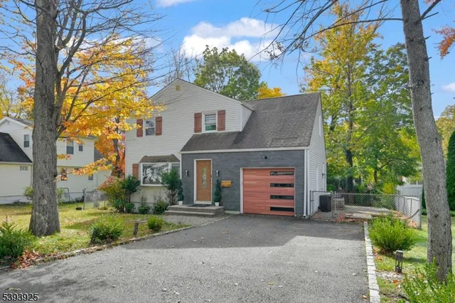 front view of a house with a street