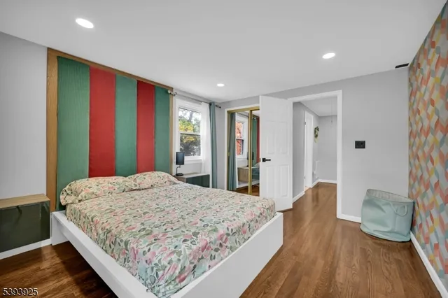 a spacious bathroom with a sink and a mirror
