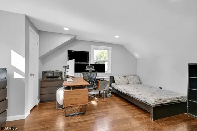 a view of a patio with chairs and potted plants