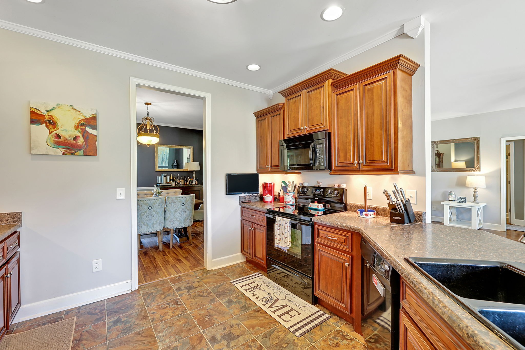 3079 Cairo Bend Road Lebanon, TN 37087 - Photo 24 of 67 a kitchen with a sink stove top oven and microwave