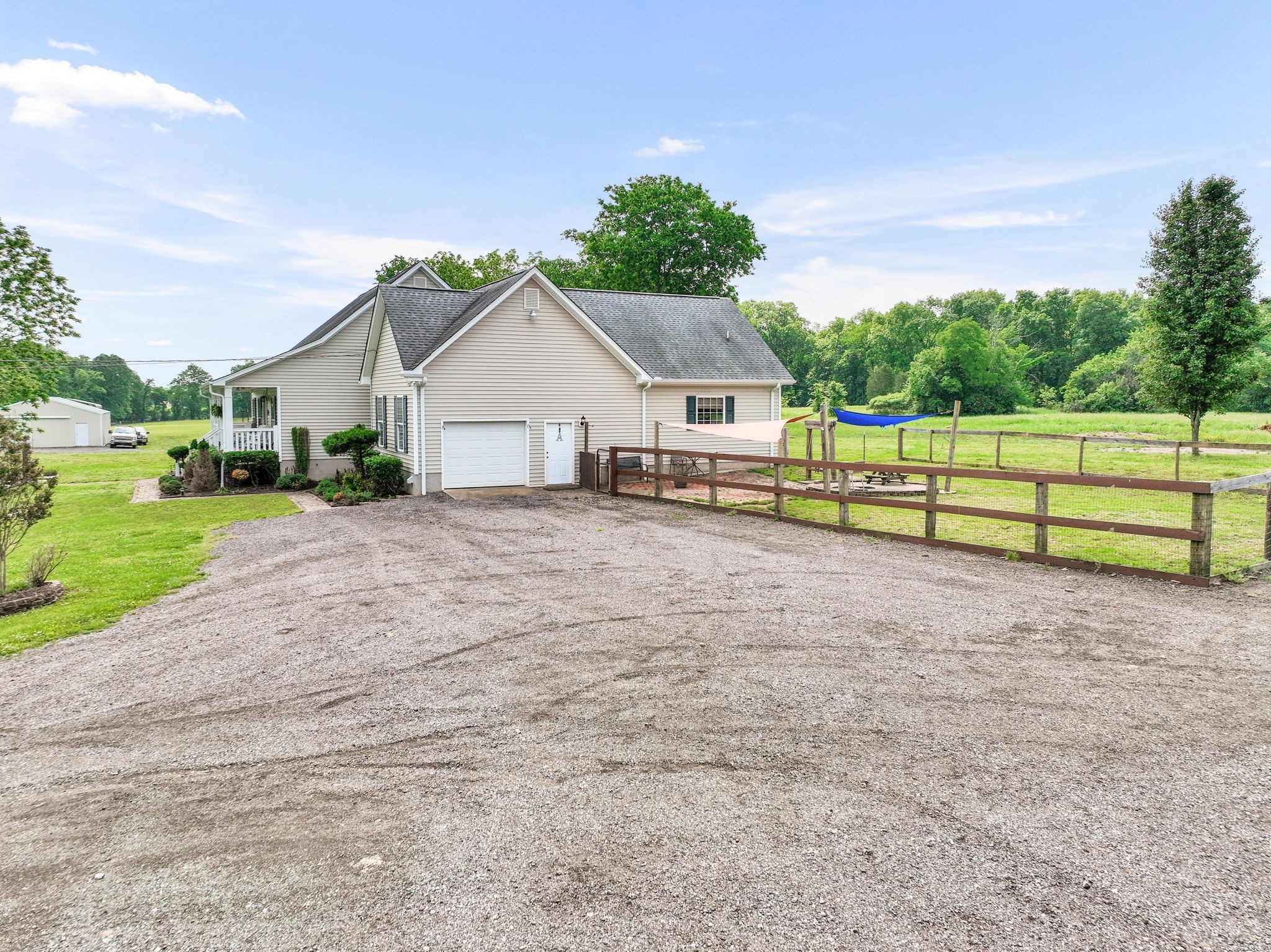 3079 Cairo Bend Road Lebanon, TN 37087 - Photo 50 of 67 a view of an house with backyard and a tree