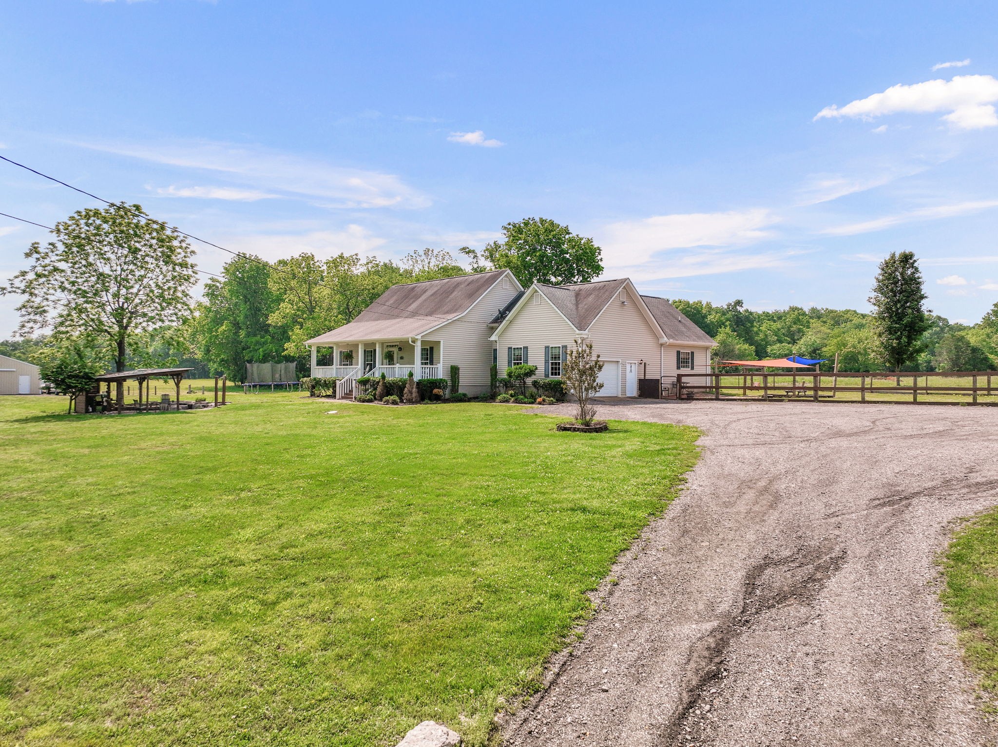 3079 Cairo Bend Road Lebanon, TN 37087 - Photo 6 of 67 a view of house with garden and tall trees
