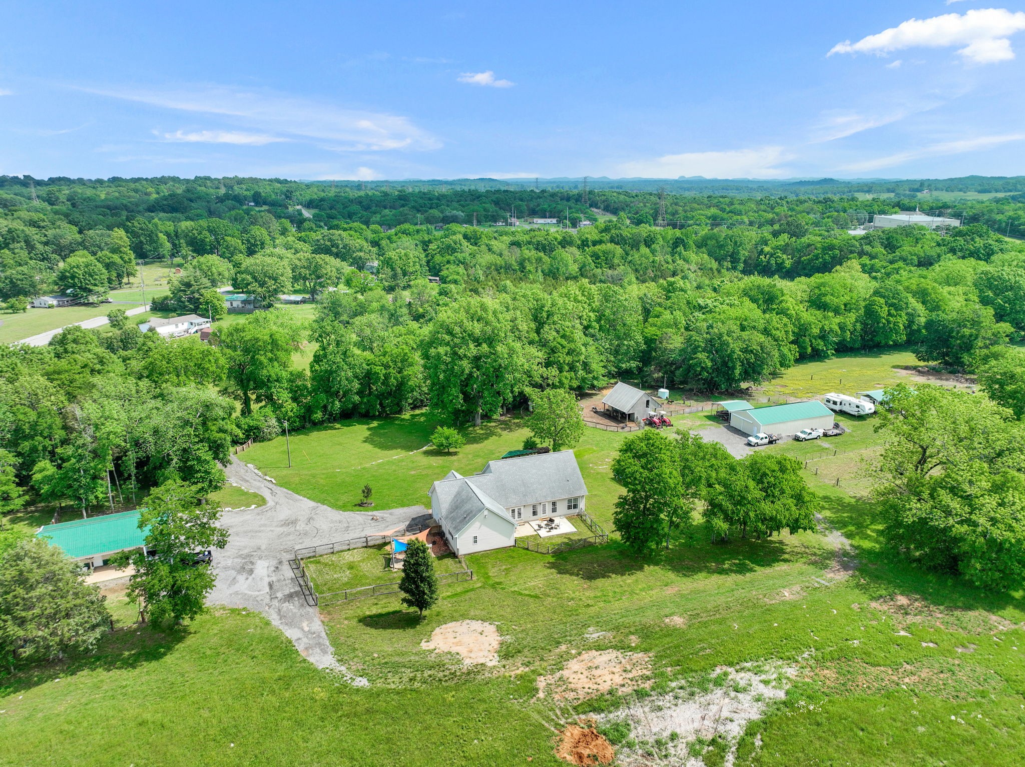 3079 Cairo Bend Road Lebanon, TN 37087 - Photo 66 of 67 a view of a garden with a building in front of it