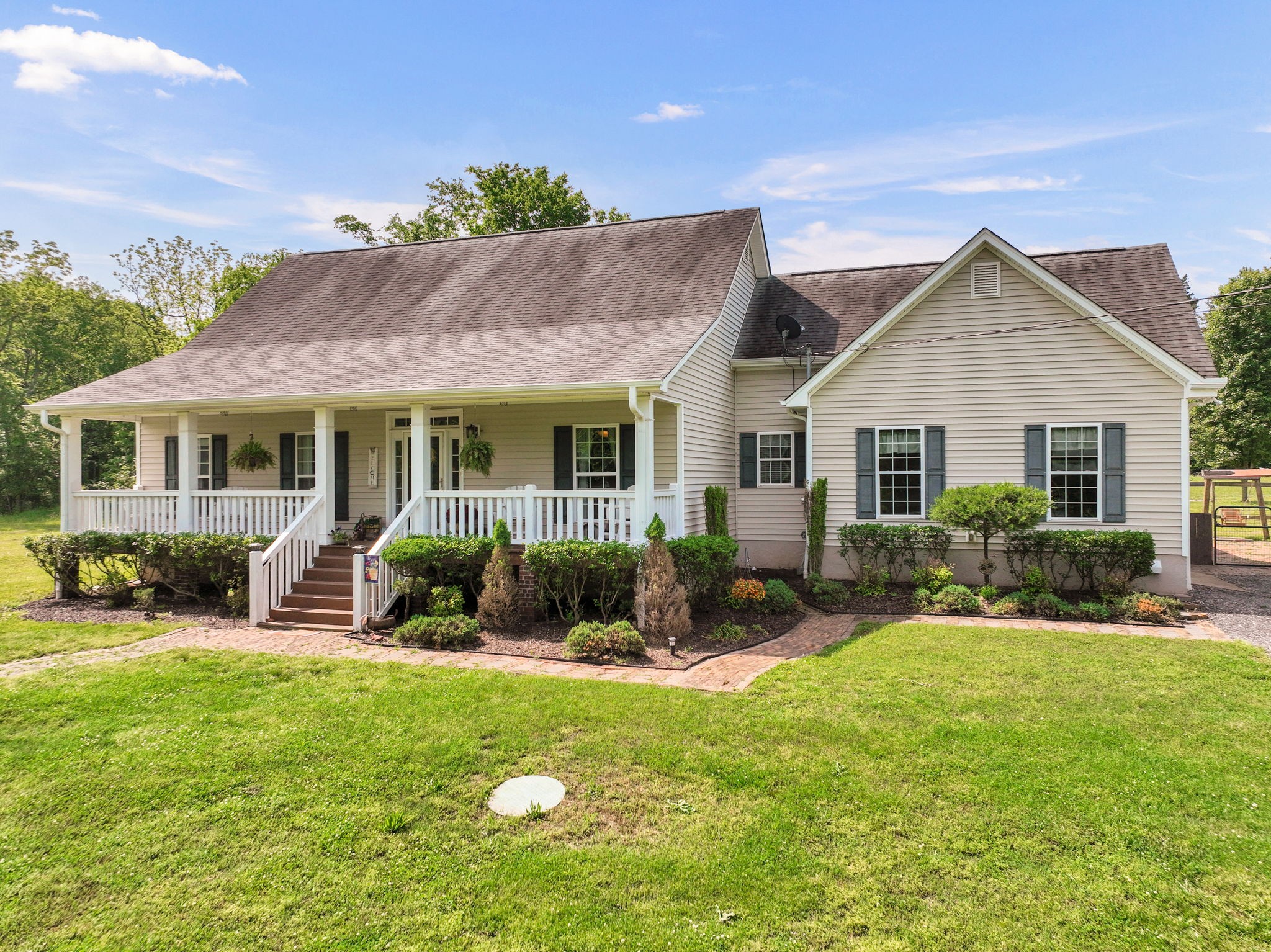 3079 Cairo Bend Road Lebanon, TN 37087 - Photo 10 of 67 a front view of a house with a yard patio and fire pit