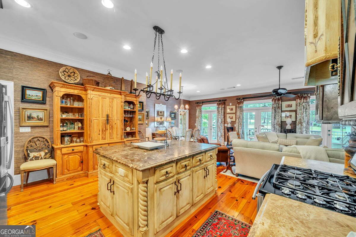 696 Cork Ferry Road Cordele, GA 31015 - Photo 16 of 79 a large white kitchen with a large window