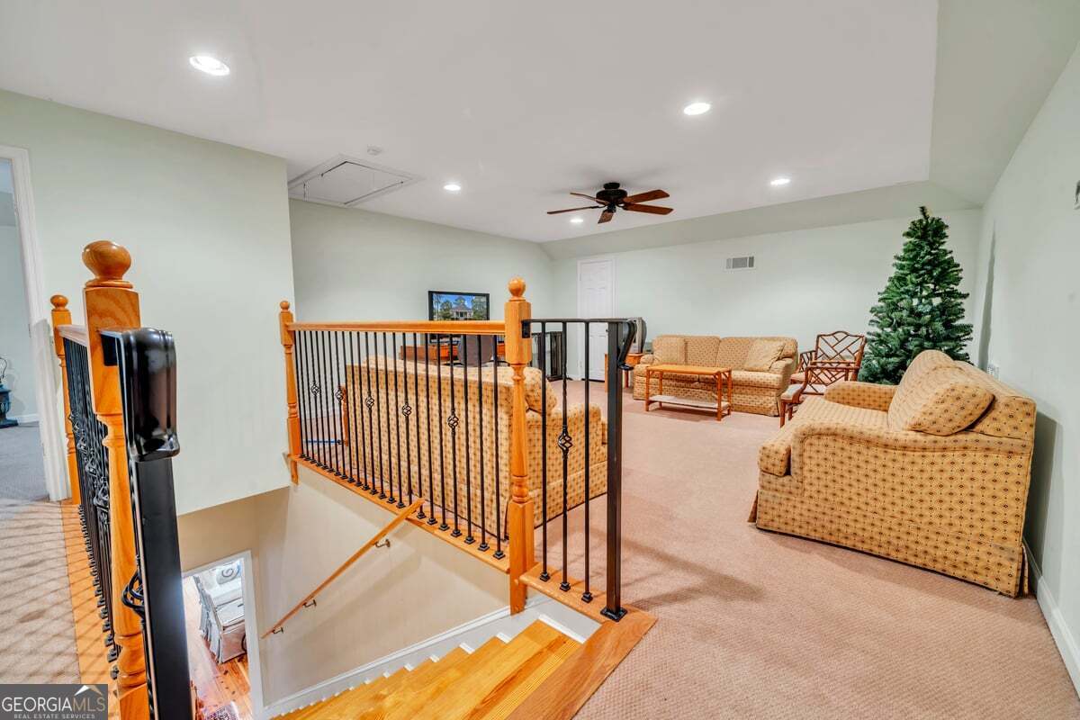 696 Cork Ferry Road Cordele, GA 31015 - Photo 35 of 79 a living room with furniture windows and a flat screen tv