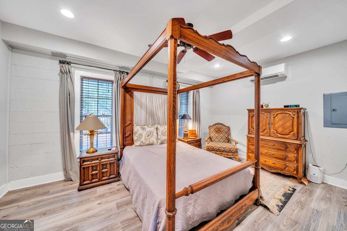 696 Cork Ferry Road Cordele, GA 31015 - Photo 48 of 79 a bedroom with furniture and a window