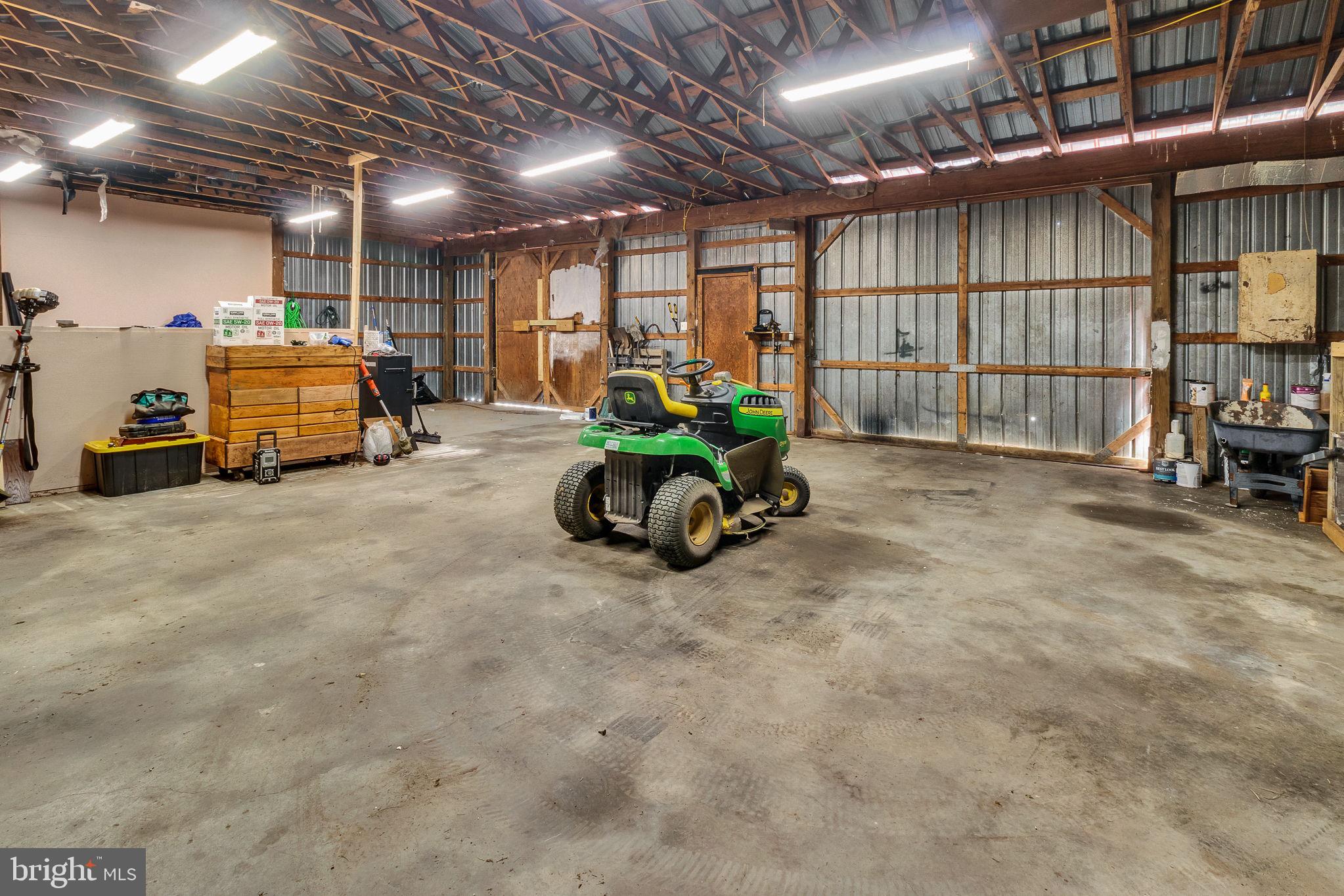9832 River Road Lancaster, VA 22503 - Photo 35 of 68 Spacious garage with ample potential.