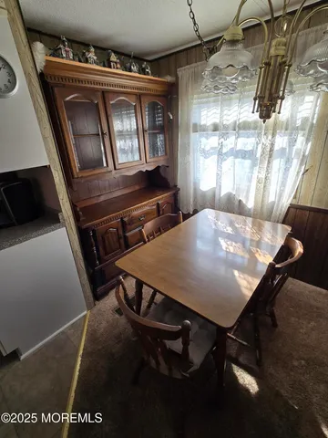 a view of a livingroom with furniture