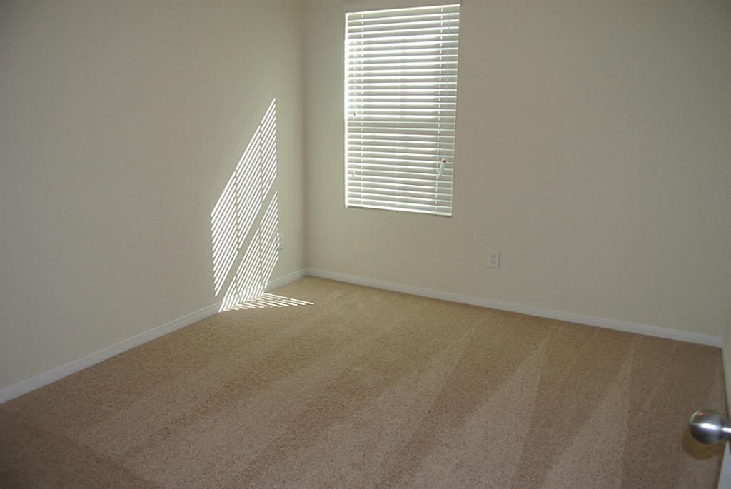 2619 Skyview Long Drive Houston, TX 77047 - Photo 8 of 11 an empty room with a window