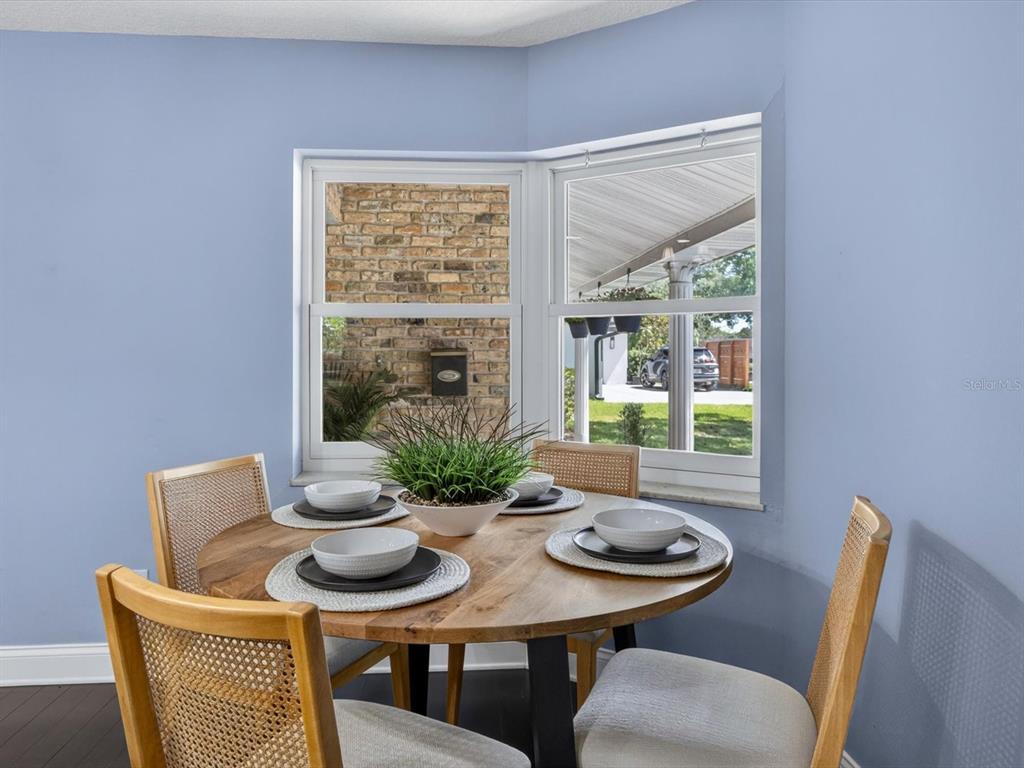 333 Cornwall Road Winter Park, FL 32792 - Photo 14 of 32 a view of a dining room with furniture window and outside view
