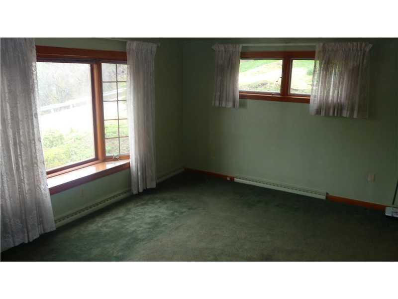 3078 Mt Troy Road Pittsburgh, PA 15212 - Photo 4 of 25 Living Room. Large living room with bay window provides great natural light