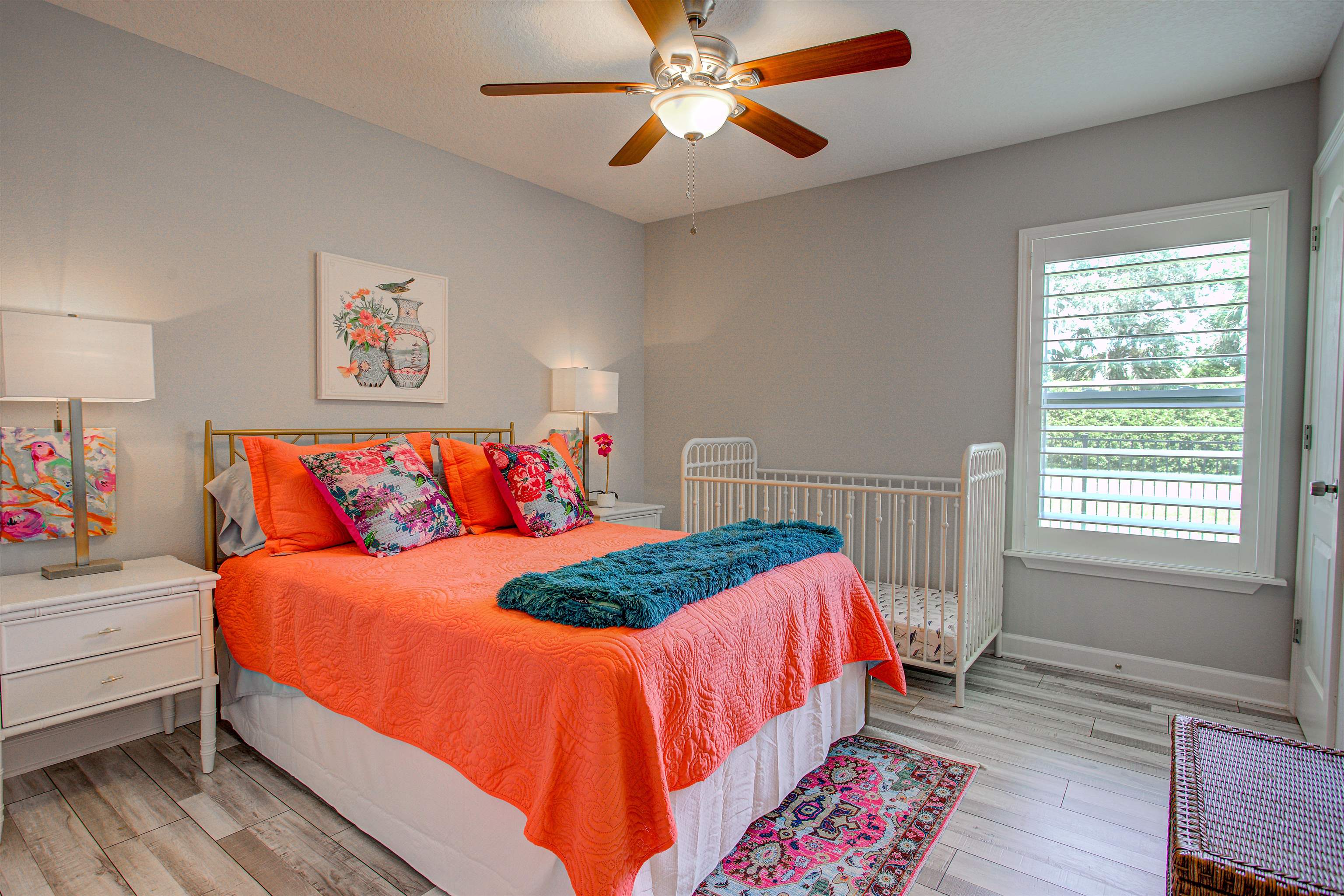 101 Linden Road St. Augustine, FL 32086 - Photo 14 of 21 a bedroom with a bed and a chandelier