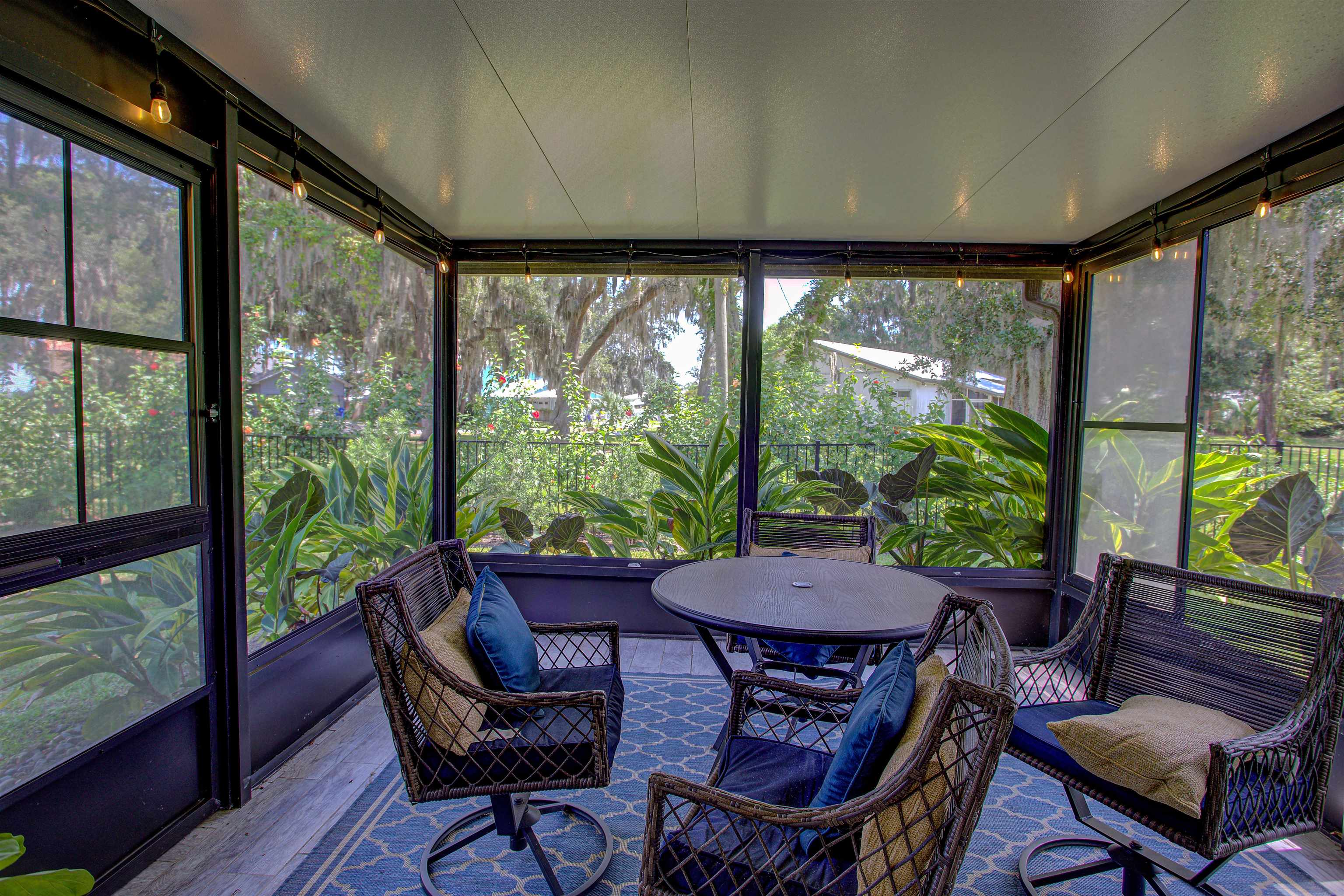 101 Linden Road St. Augustine, FL 32086 - Photo 16 of 21 a view of a patio with table and chairs