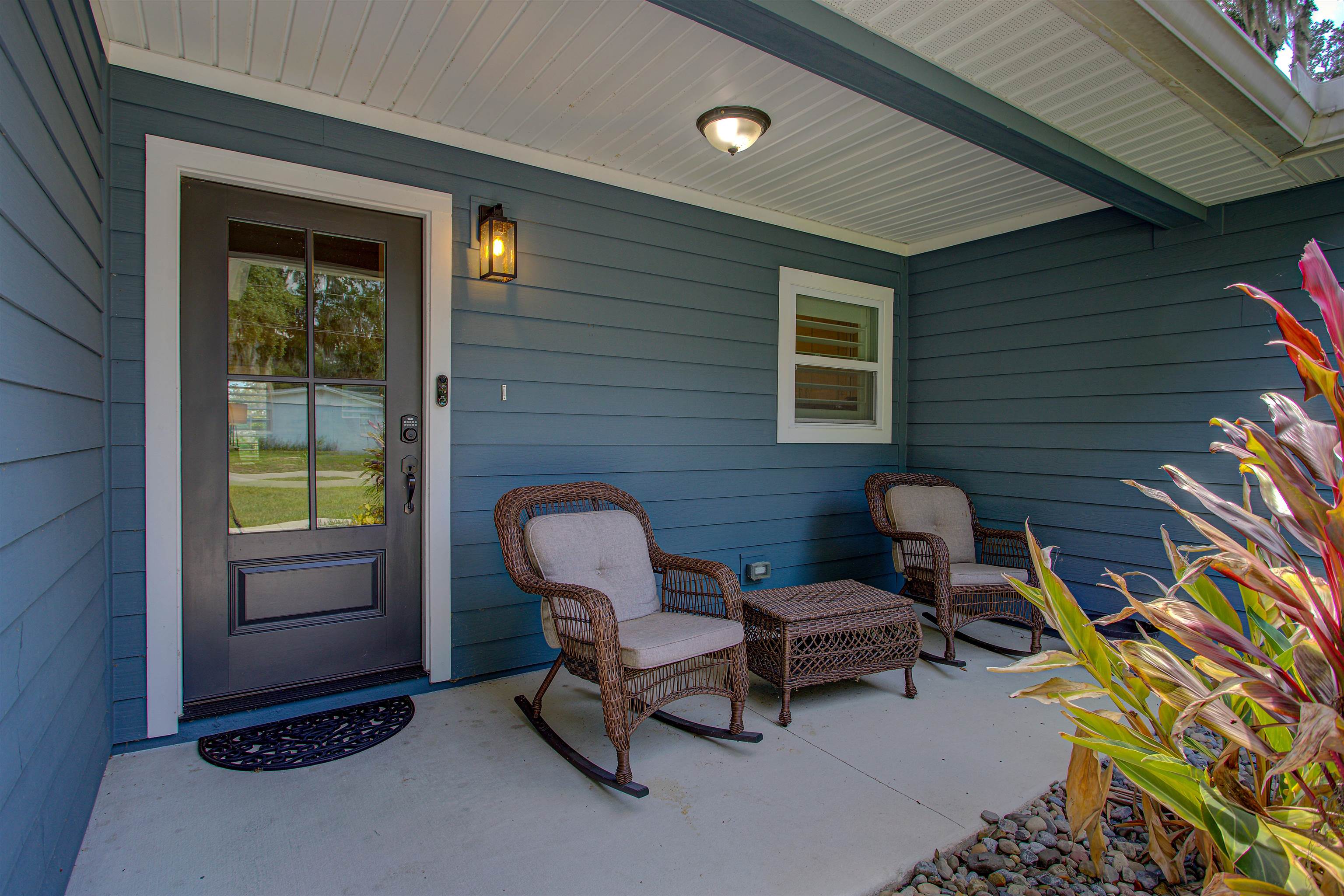 101 Linden Road St. Augustine, FL 32086 - Photo 4 of 21 a outdoor seating area with furniture and a window