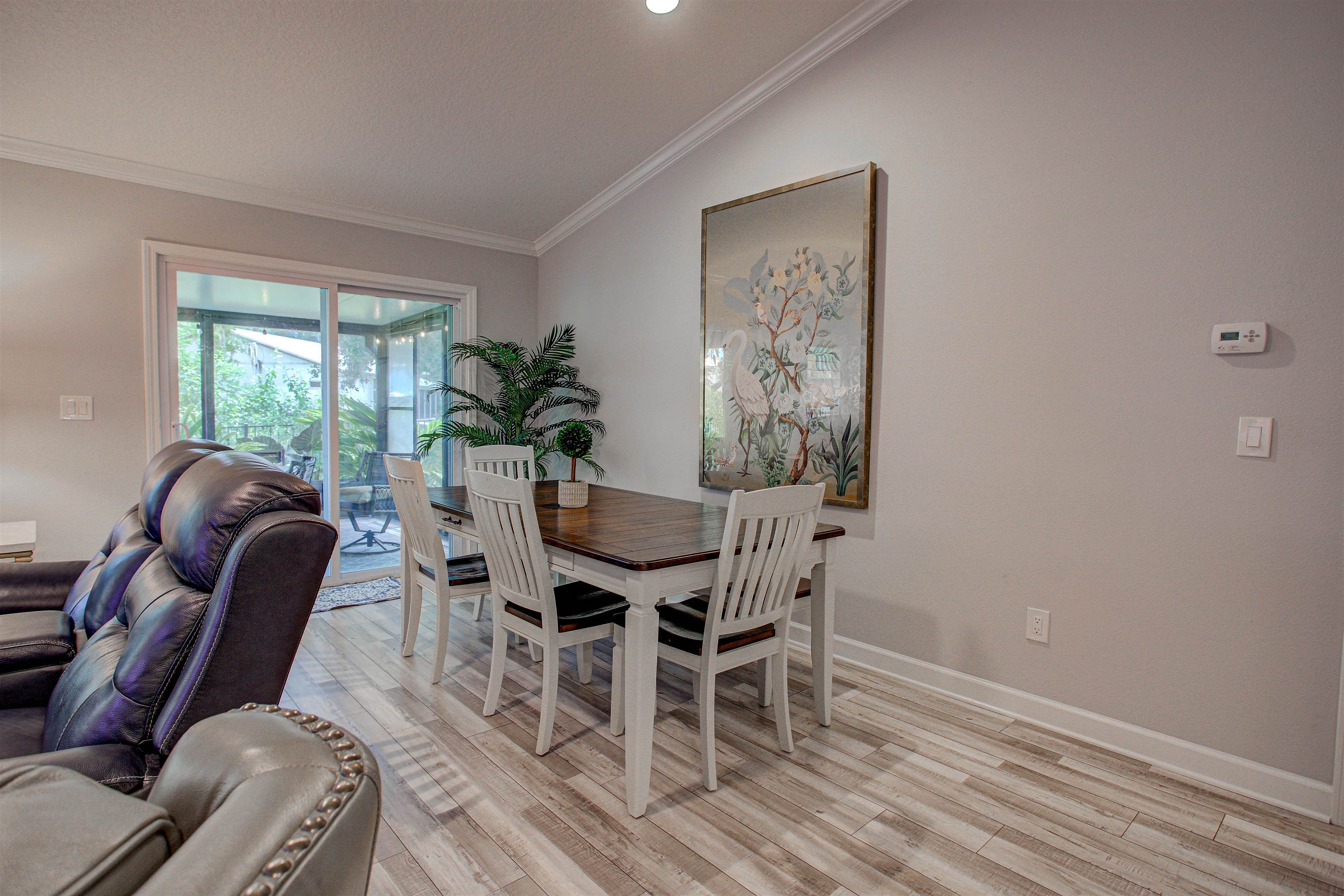 101 Linden Road St. Augustine, FL 32086 - Photo 6 of 21 a view of a dining room with furniture window and outside view