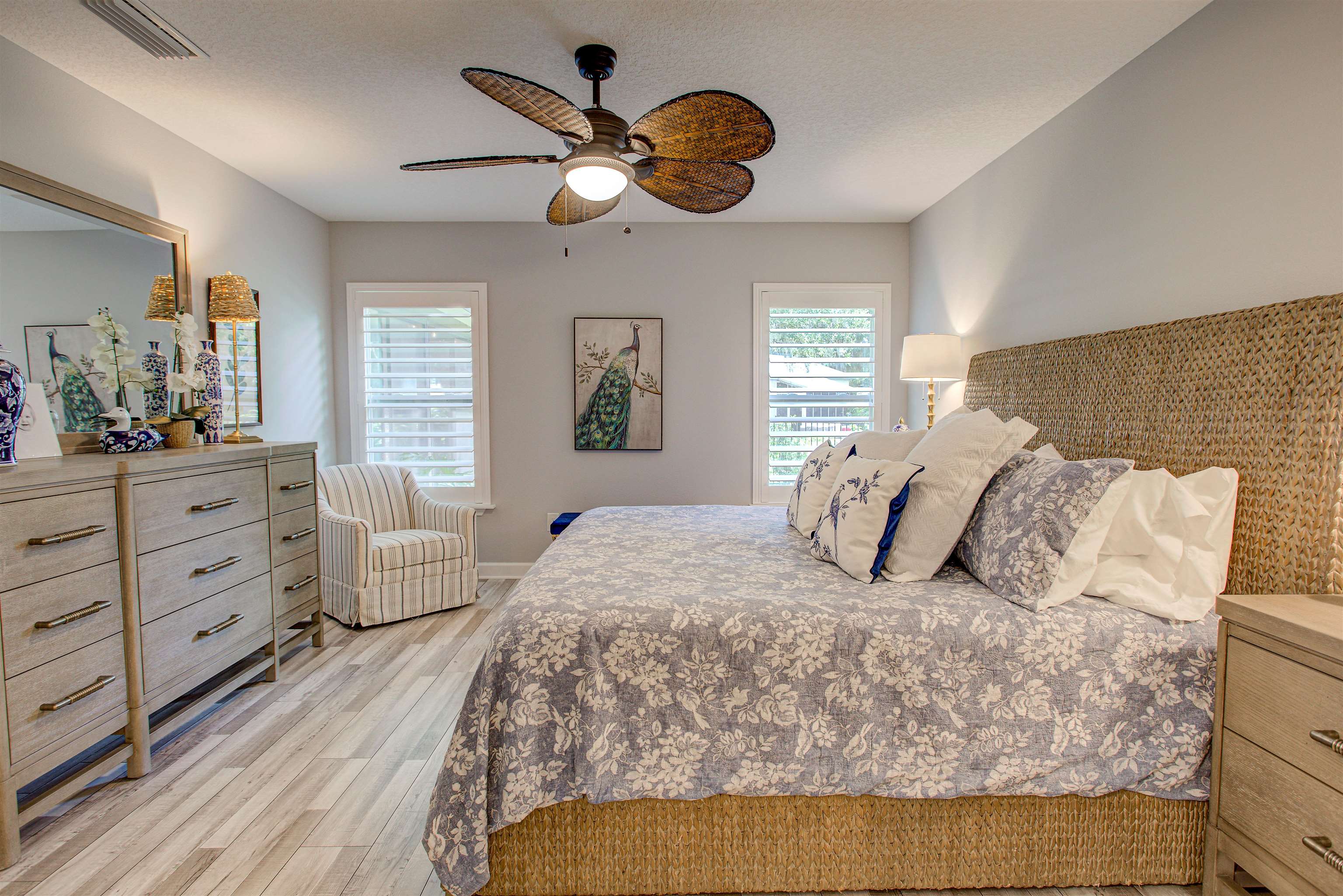 101 Linden Road St. Augustine, FL 32086 - Photo 10 of 21 a bedroom with a large bed and a chandelier