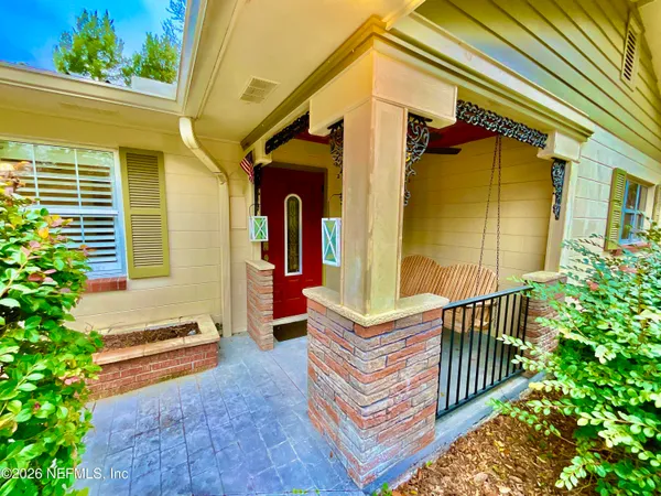 a living room with a couch and a table