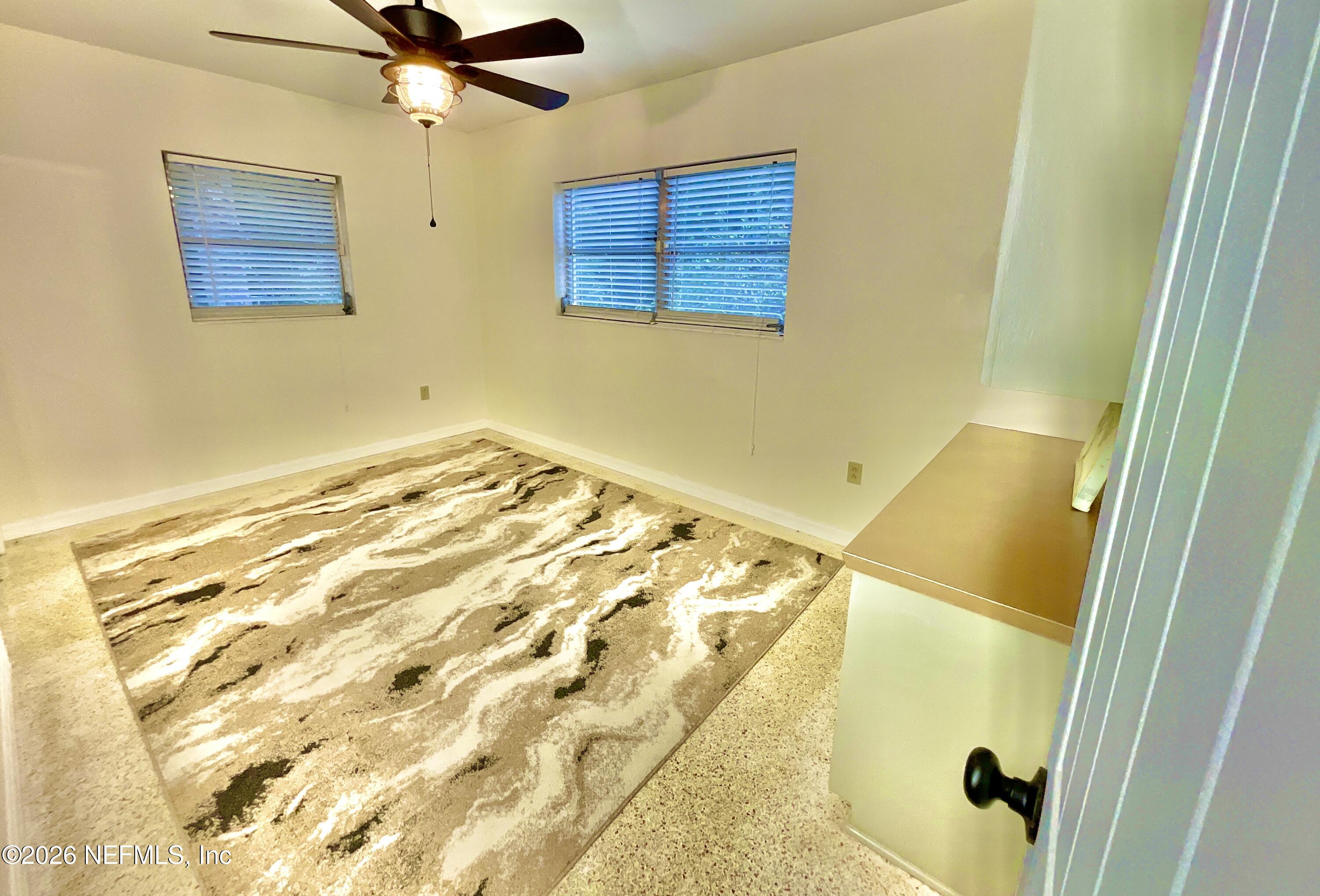 17221 Northeast 77th Lane Hawthorne, FL 32640 - Photo 35 of 59 a bathroom with a sink and a shower