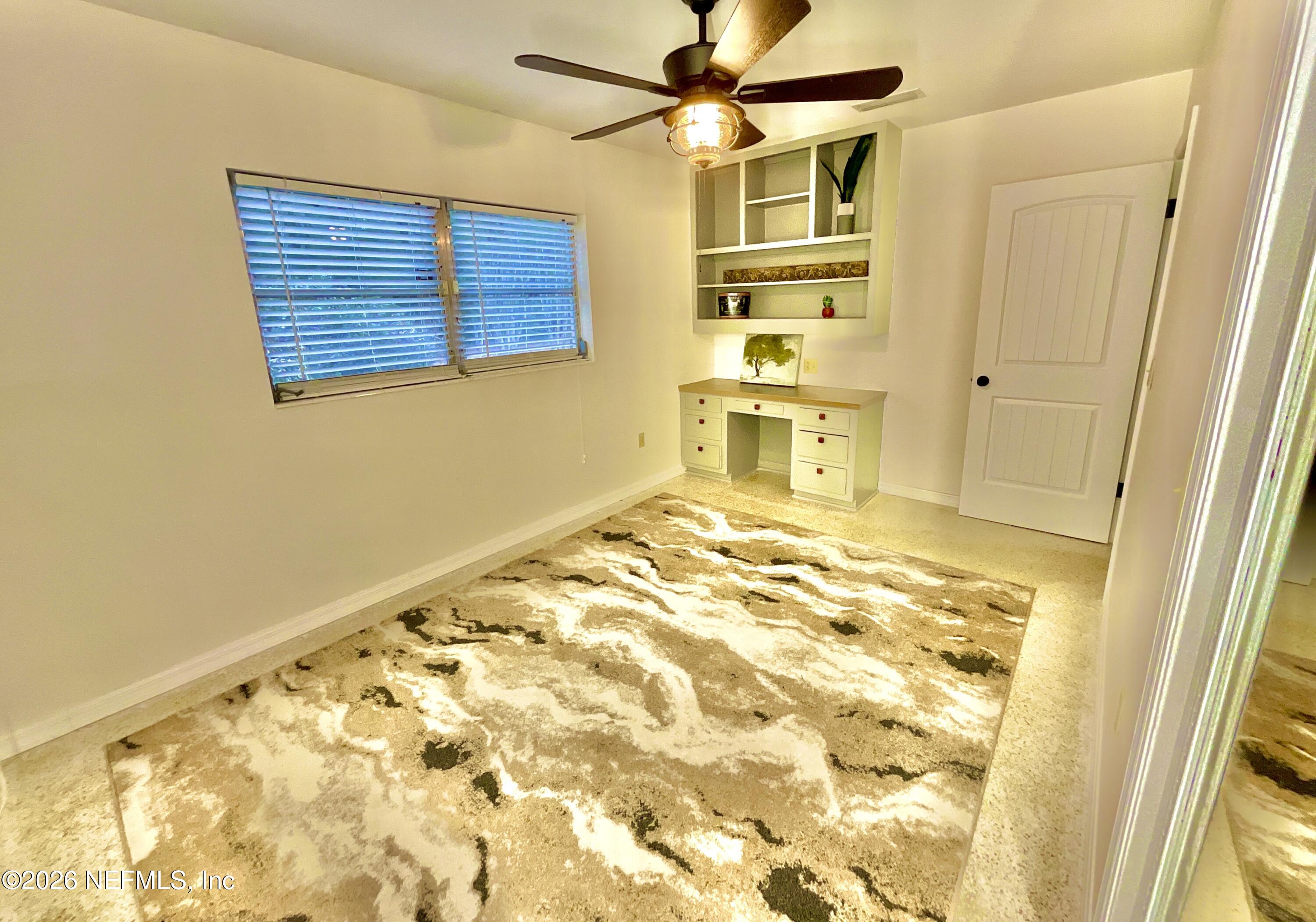 17221 Northeast 77th Lane Hawthorne, FL 32640 - Photo 36 of 59 a view of a bedroom with a natural light